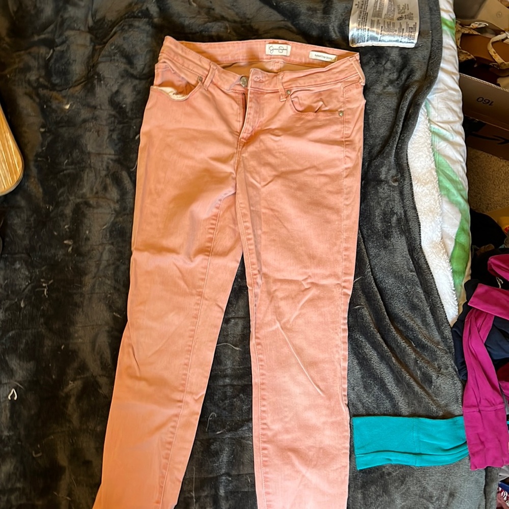 Rolled cropped skinny light pink jeans